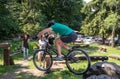 LVIV, UKRAINE - JUNE 2018: A cyclist performs tricks on a bicycle trial to overcome an obstacle course