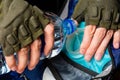 The cyclist pours water into the hydrator Royalty Free Stock Photo