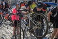 LVIV, UKRAINE - MAY 2018: The cyclist repairs his bicycle by pumping a punctured wheel Royalty Free Stock Photo