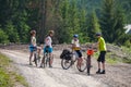 Cyclist during the rest on the gravel road