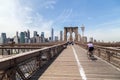 Cyclist rides across the Brooklyn Bridge in New York