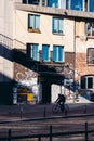 A cyclist rides past a music club in Hamburg, Germany