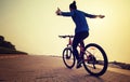 Cyclist Riding Bike With Arms Outstretched