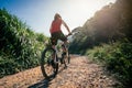 Cyclist riding a bike on a nature trail Royalty Free Stock Photo