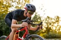 Cyclist riding a bike on an open road, Biking cyclist male athlete training hard on bicycle