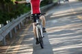 cyclist riding bike with outstretched arms on road Royalty Free Stock Photo