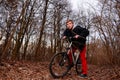 Cyclist Riding the Bike on the Trail in the Beautiful Spring Forest Wide Angle Royalty Free Stock Photo