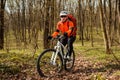 Cyclist Riding the Bike on a Trail in Summer Forest Royalty Free Stock Photo