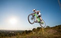 Cyclist riding downhill on mountain bike on the hill Royalty Free Stock Photo