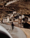 Two persons cycling in the mountains