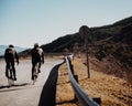 Two persons cycling in the mountains