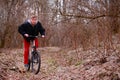 Cyclist riding a mountain bike along the forest road Royalty Free Stock Photo