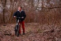 Cyclist riding a mountain bike along the forest road Royalty Free Stock Photo