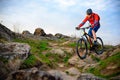 Cyclist Riding Mountain Bike on the Beautiful Spring Rocky Trail. Extreme Sport Concept Royalty Free Stock Photo