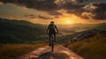 cyclist riding mountain bike on rocky trail at sunrise. cyclists, they cycle through rural and forest roads. Cinematic shot of