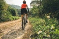 Cyclist riding mountain bike on rocky trail