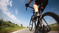 A cyclist on the road. Biker riding a bike on the way view from below on a background of blue summer sky, Generative AI