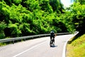 Cyclist on the road in Schei cvartal in south of the city Brasov, Transylvania Royalty Free Stock Photo