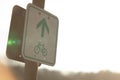 Cyclist road sign with a green frame and white background