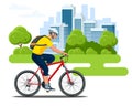 Cyclist side view in a helmet on a city background. Healthy lifestyle, environmentally friendly city transport.