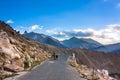 Cyclist standing on mountains road. Himalayas Royalty Free Stock Photo