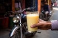 a cyclist stopping for some refreshing mango lassi