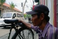 A Cyclist Taking a Rest or Ojek Sepeda