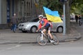 Cyclist with a Ukrainian flag