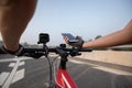 Cyclist using smartphone for navigation Royalty Free Stock Photo