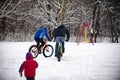 Cyclist in winter on a bicycle with very wide wheels 2018