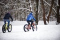 Cyclist in winter on a bicycle with very wide wheels 2018