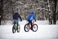 Cyclist in winter on a bicycle with very wide wheels 2018