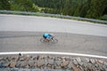 Cyclist woman from above by downhill