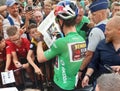 Cyclist Wout van Aert in a green jersey in Herentals (Belgium)