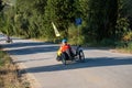 Cyclists in Val d `Orcia in Tuscany, Italy