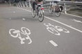 Cyclists on Bike Lane in Amsterdam, Holland Royalty Free Stock Photo