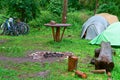 Campground, cyclists on a camping, tent and bicycles