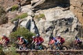 Cyclists cycling in a peleton on Chapmans Peak Drive, Cape Town, South Africa. They are preparing for the Argus race. Royalty Free Stock Photo