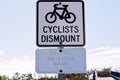 Cyclists To Dismount Signs