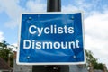 Cyclists Dismount sign Royalty Free Stock Photo