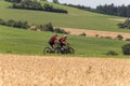 cyclists in a distance view on a summer sunny day