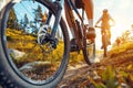 Cyclists enjoying a scenic ride along a dusty rural pathway in picturesque surroundings