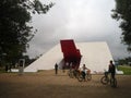 Cyclists at the entrance of the Ibirapuera Auditorium in Sao Paulo, Brazil