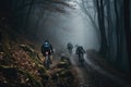 cyclists going down a mountain slope in the forest