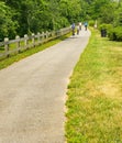 Cyclists on a Morning Ride on the Roanoke River Creek Greenway Royalty Free Stock Photo