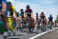 Cyclists in motion racing together