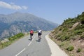 Cyclists on mountain road in Corsica, France Royalty Free Stock Photo