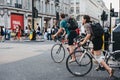 Cyclists on Oxford Street, London, UK.