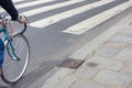 Cyclists on a Paris street just before a zebra crossing, Paris, May 2014 Royalty Free Stock Photo