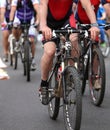 cyclists pedal quickly through the streets during the sporting e Royalty Free Stock Photo